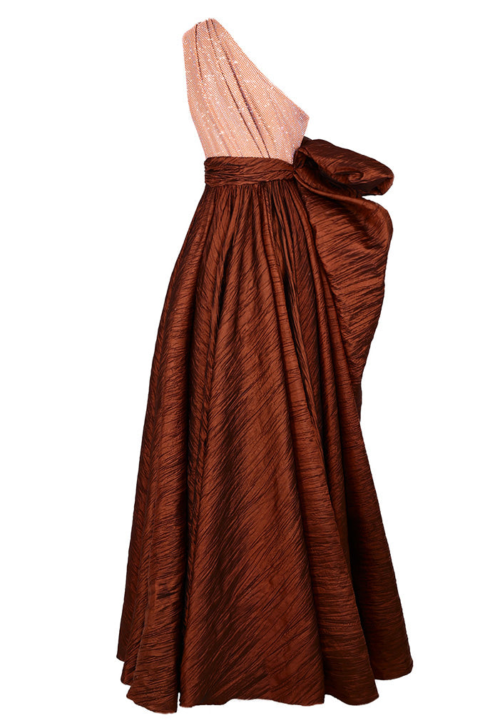 Asymmetric dress with a bow at the waist