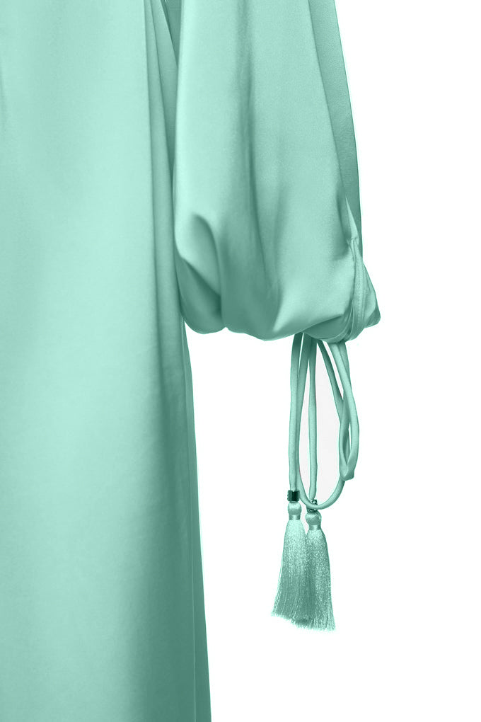 Beach tunic with belt and tassels on the sleeves