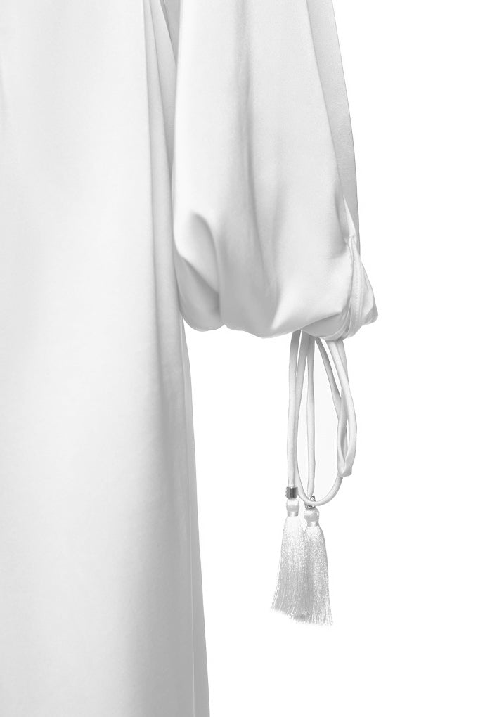 Beach tunic with belt and tassels on the sleeves